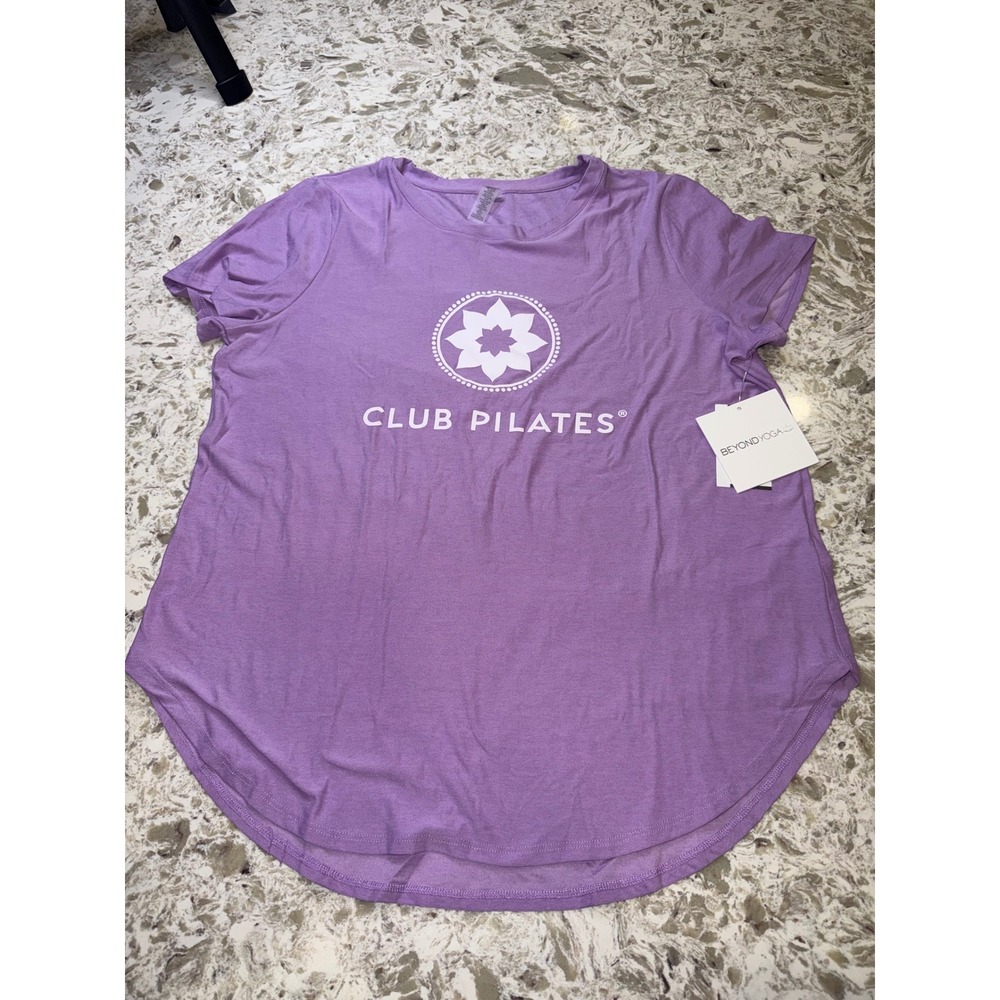 Beyond Yoga Club Pilates Graphic T-Shirt Purple Short Sleeve Curved Herm Size M